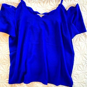 Royal blue top with scalloped edge detail around neck line
